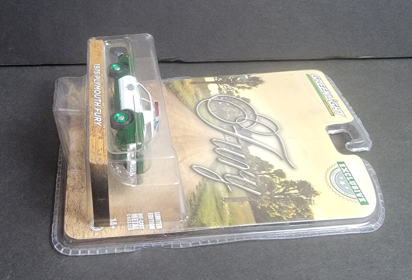 1:64 1975 Plymouth Fury, GREEN MACHINE "Capital City"